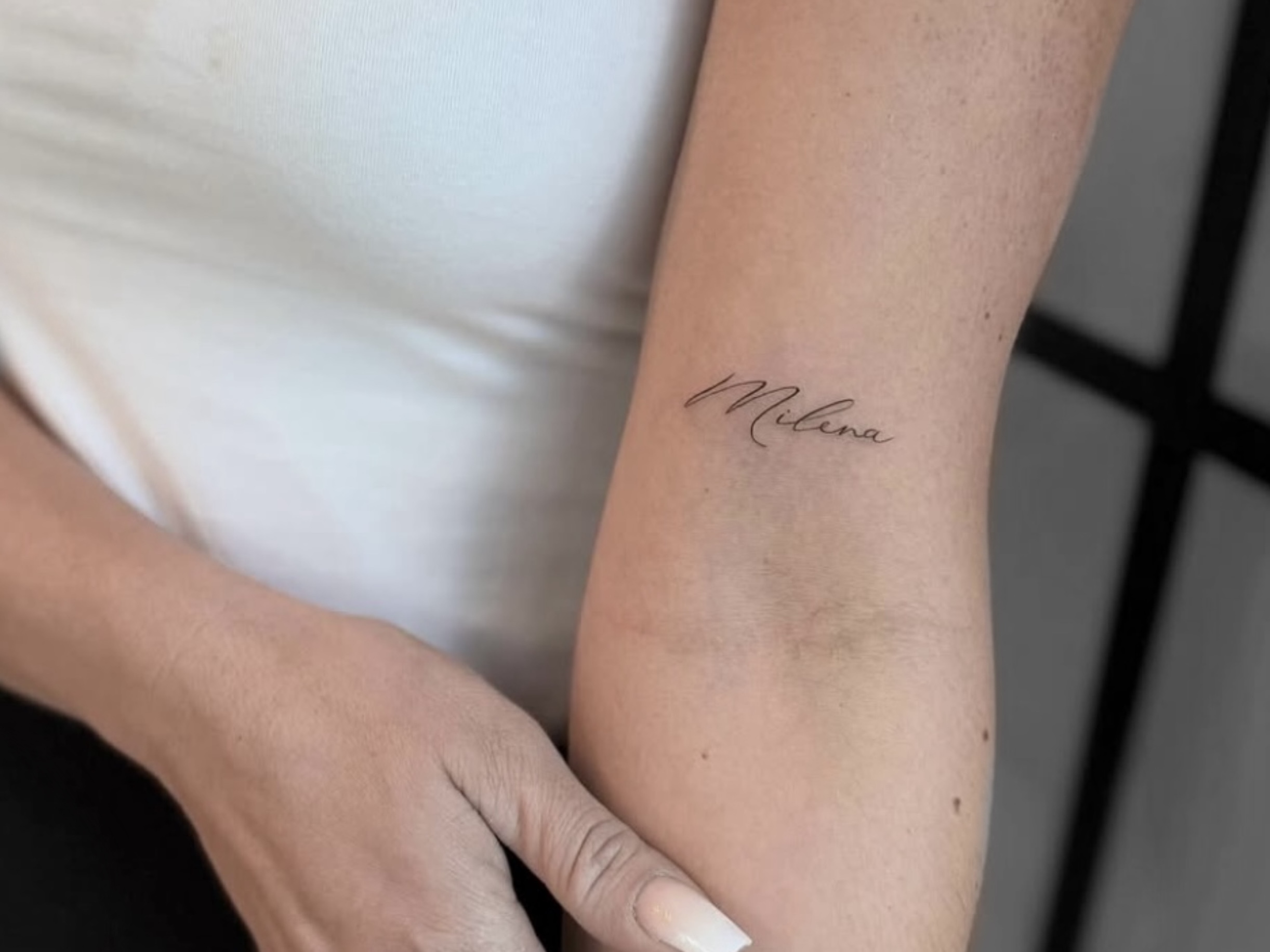 Fineline Schriftzug Tattoo Berlin